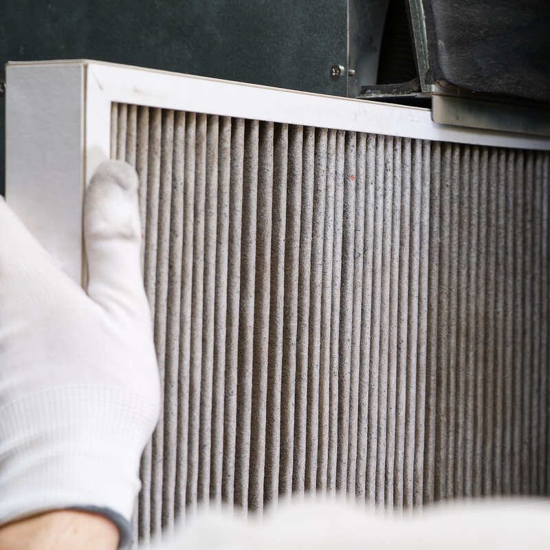 hvac_filter_replacement_home_central_air_system_servicemen_changing (1)