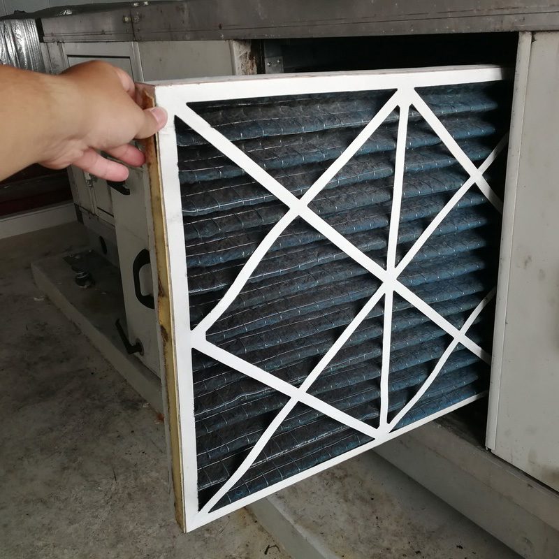 soft_focus_filter_air_handing_unit_technician_checking_prefilter